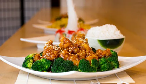 General Gau's chicken with steamed broccoli